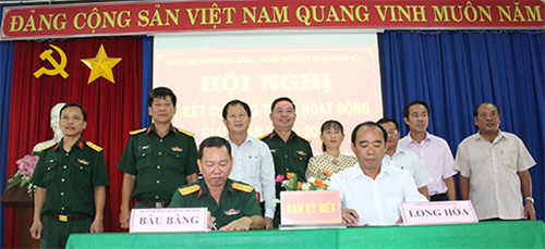 Ban CHQS huyện Bàu Bàng, tỉnh Bình Dương ký kết hoạt động với Nông trường Cao su Long Hòa